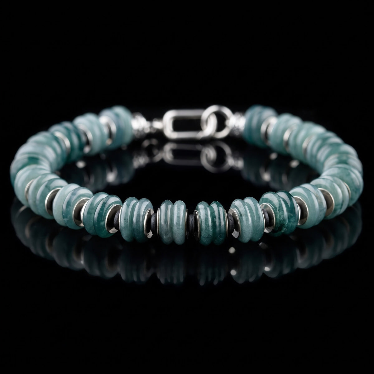 Guatemalan Jade Bracelet I with blue-green jade beads, hematite spacers and a sterling silver clasp