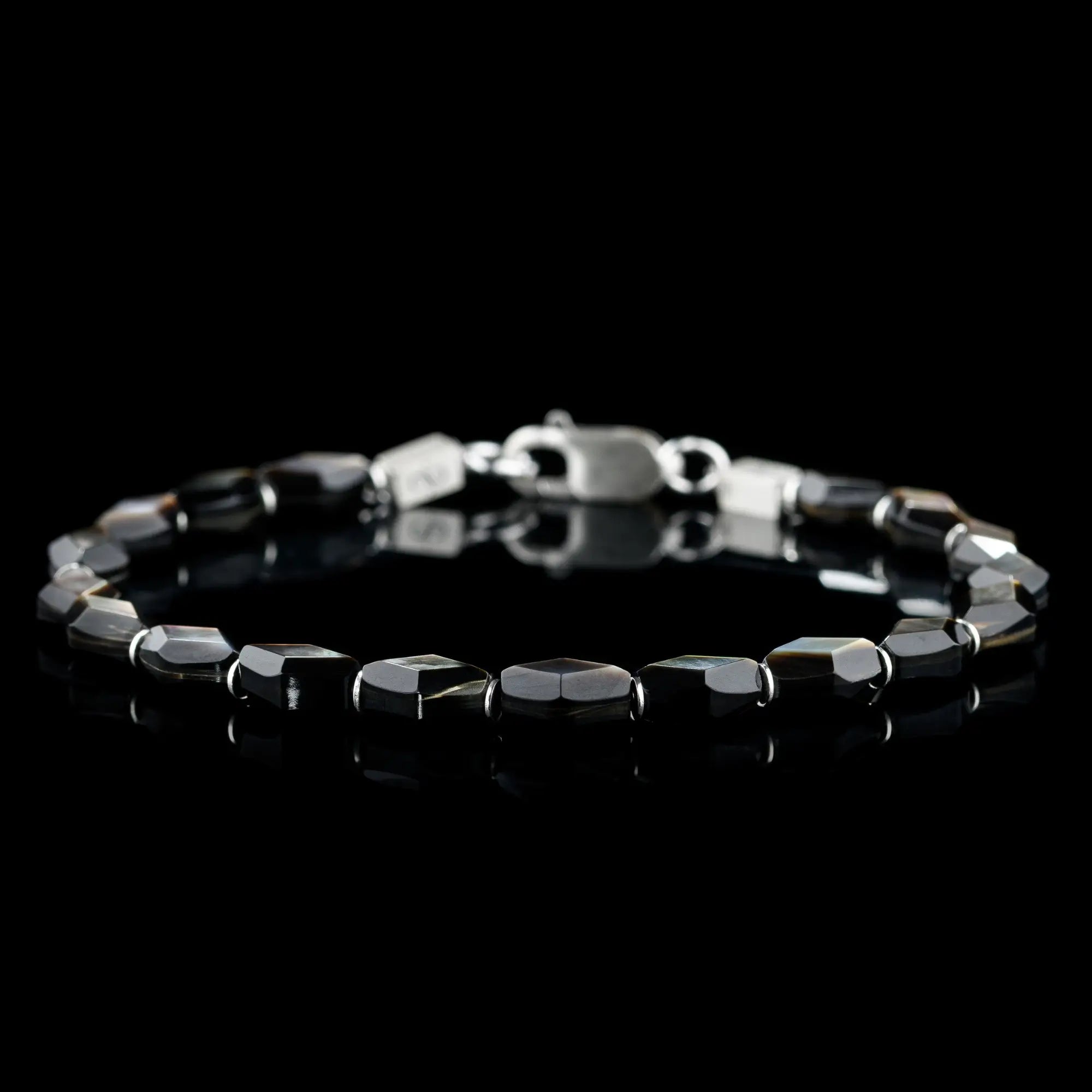 Black lip oyster bracelet for men. 9x6mm shell tiles. Aurum Brothers.