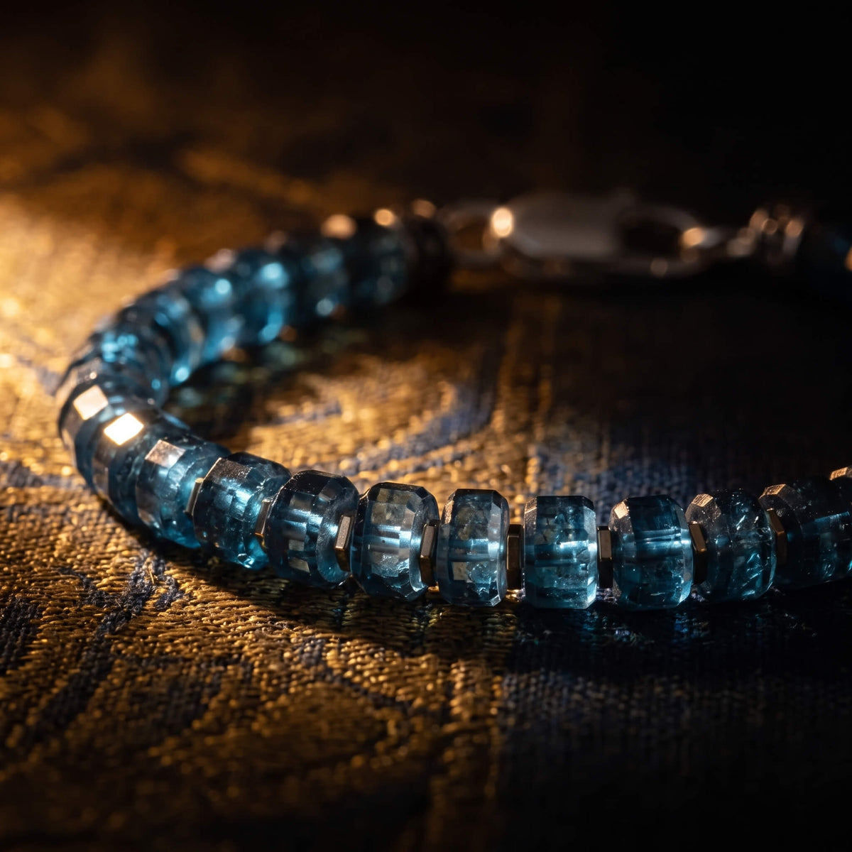 London Blue Topaz IV — Blue topaz stones on a brown textured surface